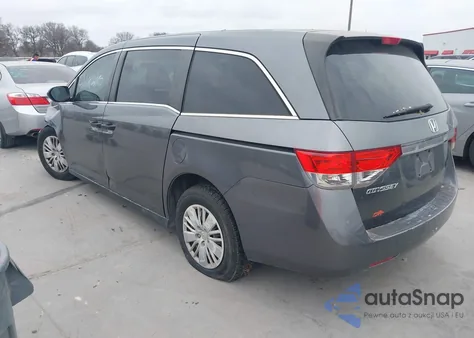 2014 Honda Odyssey Lx z USA, uszkodzony, nr VIN 5FNRL5H24EB029298